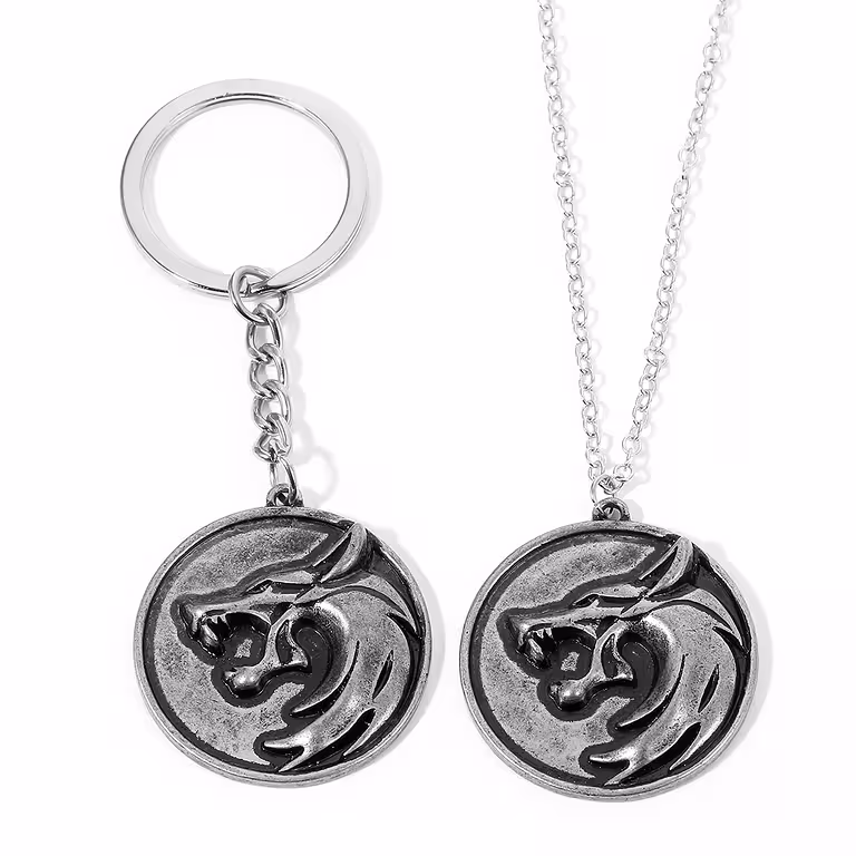 Set med Halsband och Nyckelring The Witcher – Silverfärgat Vargmedaljong, Antik Design