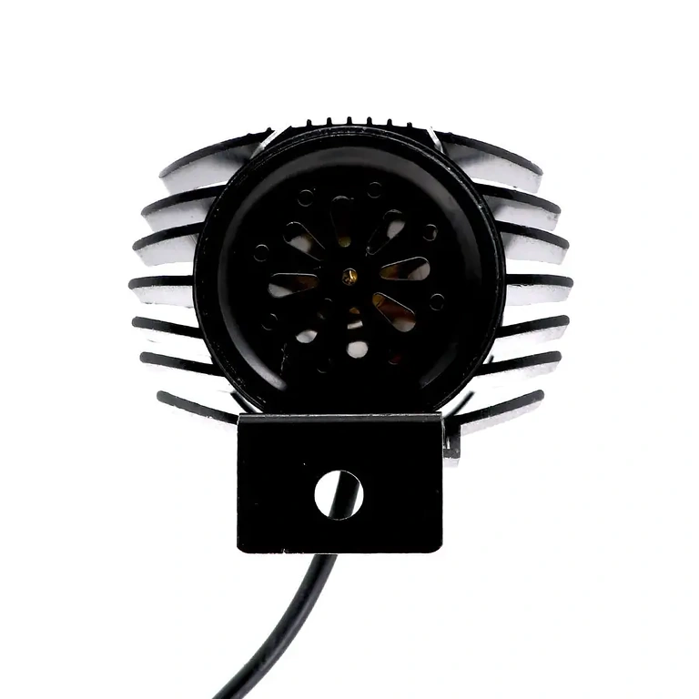 Baksida av strålkastare med inbyggd tuta Baksida av strålkastare med integrerad elektronisk signalhorn